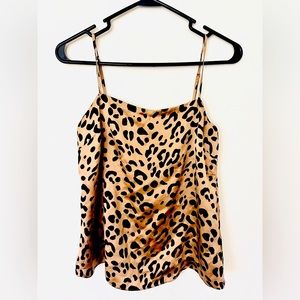 100% silk cami top from a great Australian brand. Top is in great quality.